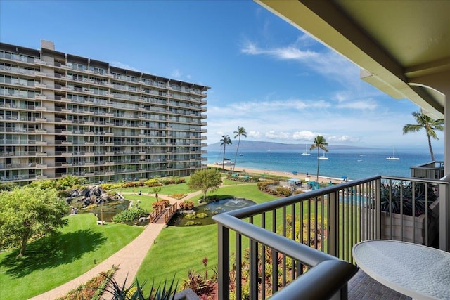 balcony featuring a water view