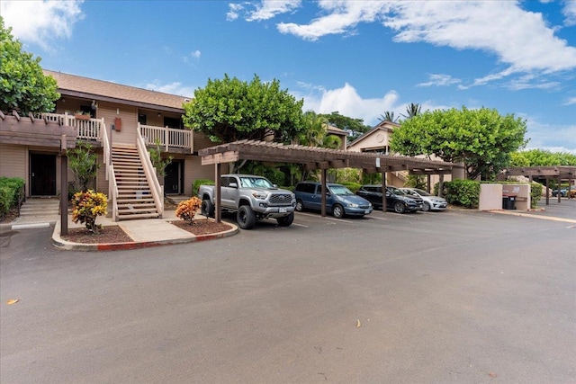 view of car parking featuring a carport