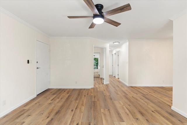 empty room featuring ceiling fan, light hardwood / wood-style flooring, and ornamental molding