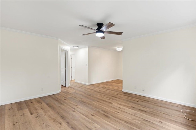 empty room featuring light hardwood / wood-style floors, ornamental molding, and ceiling fan