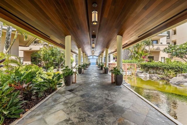 view of patio featuring a water view