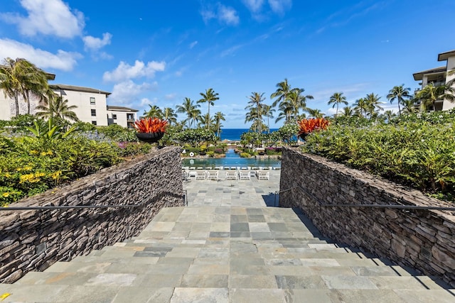 view of patio / terrace with a water view