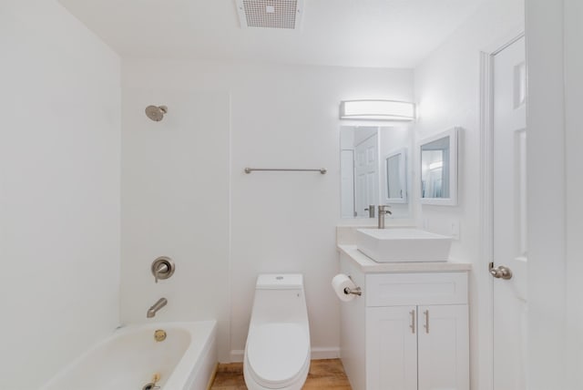 full bathroom with vanity,  shower combination, and toilet