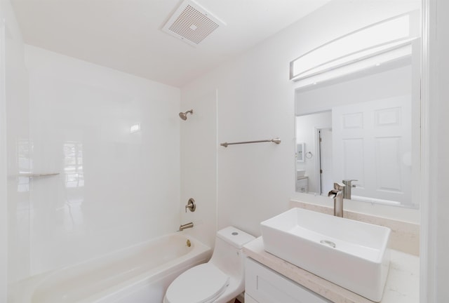 full bathroom featuring vanity, shower / bath combination, and toilet