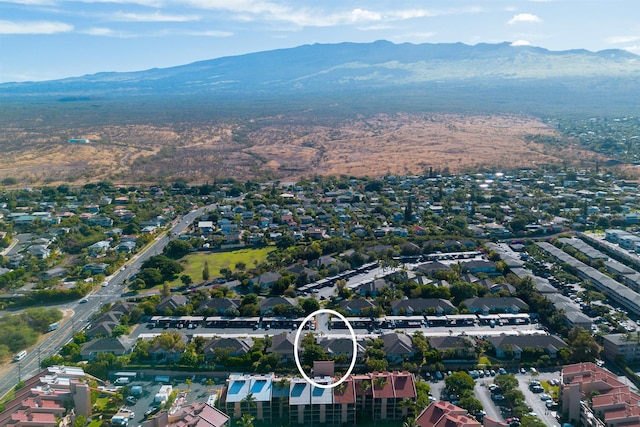 drone / aerial view featuring a mountain view