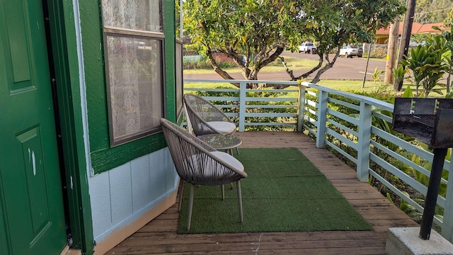 balcony featuring a porch