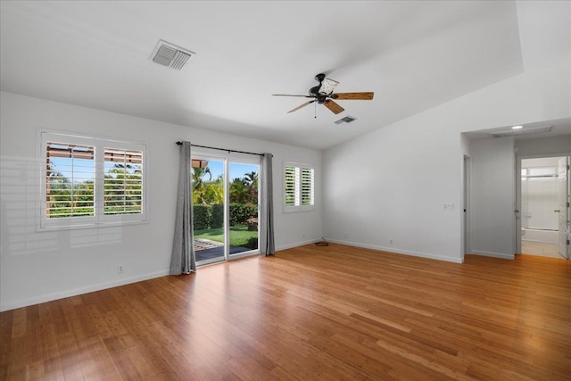 23 Poinciana Rd, Lahaina, HI 96761 - unfurnished room with ceiling fan, light wood-style flooring, baseboards, and lofted ceiling