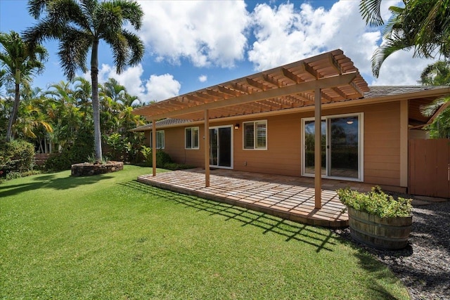 23 Poinciana Rd, Lahaina, HI 96761 - rear view of house featuring a yard, a pergola, and a patio area