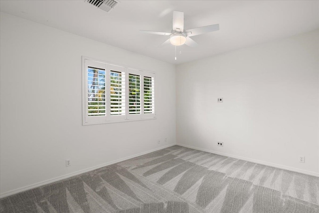 23 Poinciana Rd, Lahaina, HI 96761 - spare room with carpet floors, ceiling fan, and baseboards