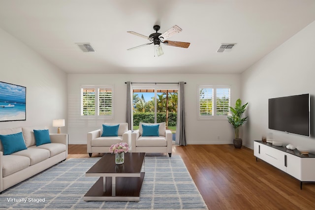 23 Poinciana Rd, Lahaina, HI 96761 - living room with a ceiling fan, wood finished floors, baseboards, and vaulted ceiling