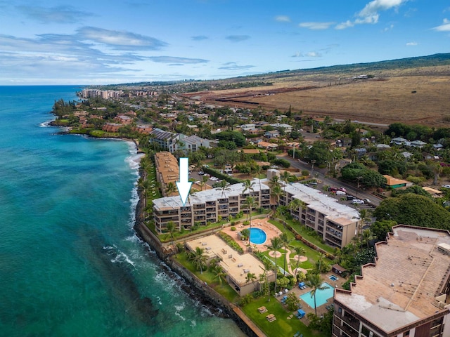 drone / aerial view with a water view