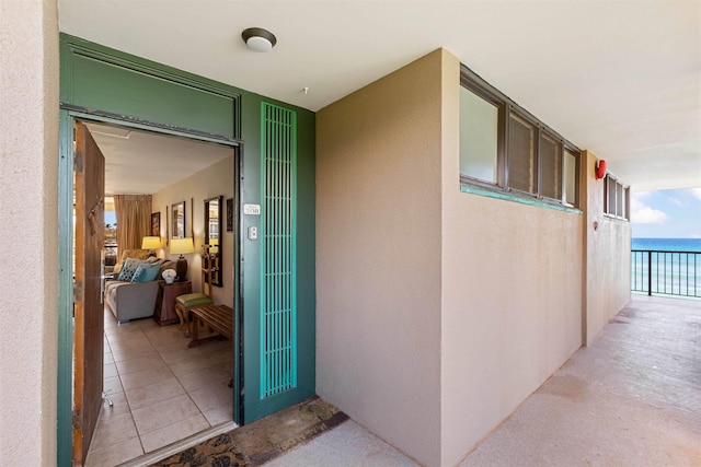 entrance to property featuring a water view