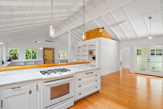 kitchen with light wood finished floors, ceiling fan, white cabinets, french doors, and white gas range oven