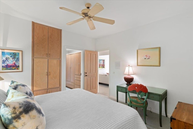 bedroom featuring ceiling fan and light colored carpet