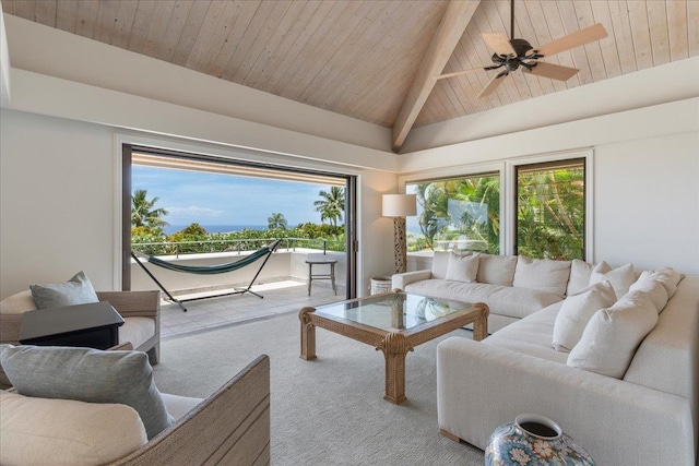 carpeted living room with beamed ceiling, high vaulted ceiling, ceiling fan, and wood ceiling