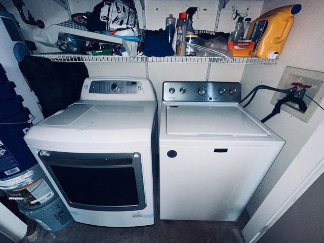 laundry room with separate washer and dryer