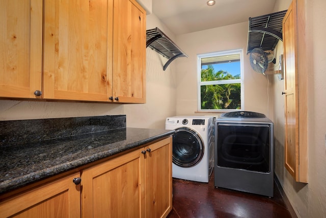 laundry area with cabinet space and washer and dryer