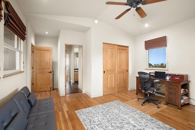 office with baseboards, lofted ceiling, ceiling fan, light wood-style floors, and recessed lighting