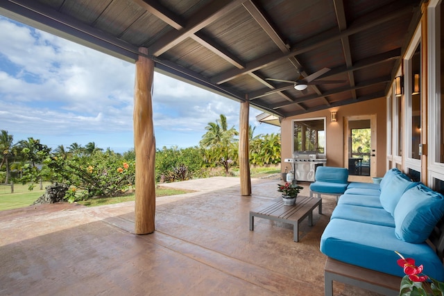 view of patio with ceiling fan and an outdoor living space