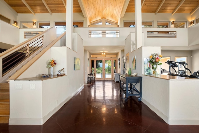 hallway with french doors, wood ceiling, high vaulted ceiling, beamed ceiling, and baseboards