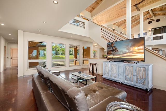 living room featuring wood ceiling, high vaulted ceiling, beamed ceiling, and recessed lighting