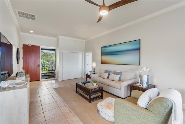 living room featuring light tile patterned flooring, visible vents, a ceiling fan, and ornamental molding