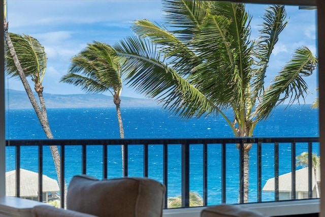 balcony featuring a water view