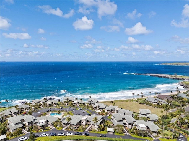 drone / aerial view featuring a residential view and a water view