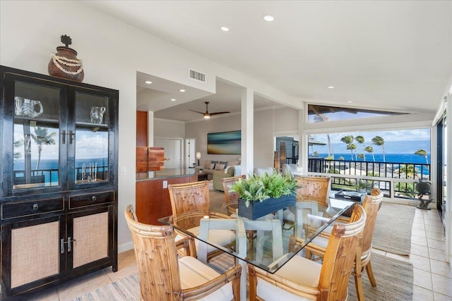 dining room featuring visible vents, a ceiling fan, recessed lighting, light tile patterned floors, and lofted ceiling