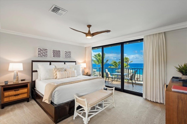 bedroom featuring visible vents, ornamental molding, access to outside, expansive windows, and light colored carpet