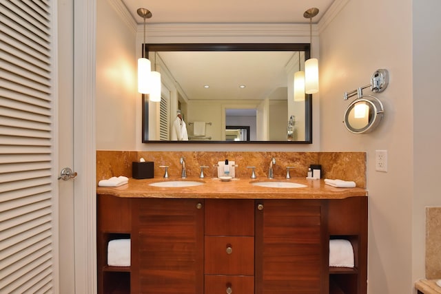 bathroom featuring backsplash, vanity, and crown molding