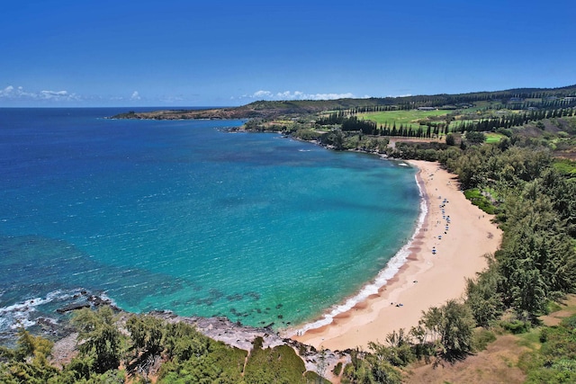 aerial view featuring a water view and a beach view