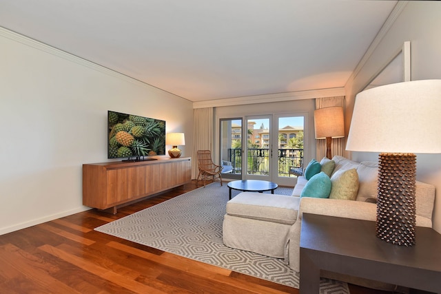 living room featuring crown molding, french doors, and hardwood / wood-style flooring