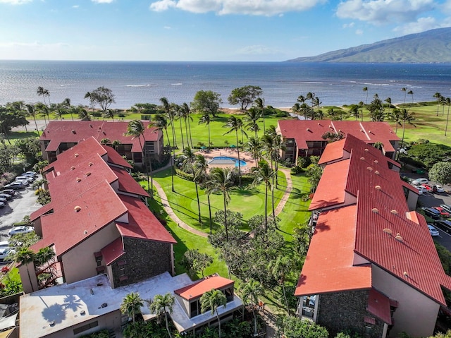 bird's eye view with a water and mountain view