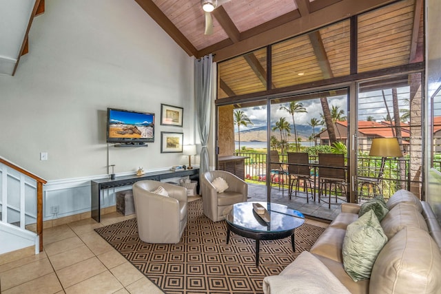 living room featuring high vaulted ceiling, wooden ceiling, ceiling fan, and light tile floors