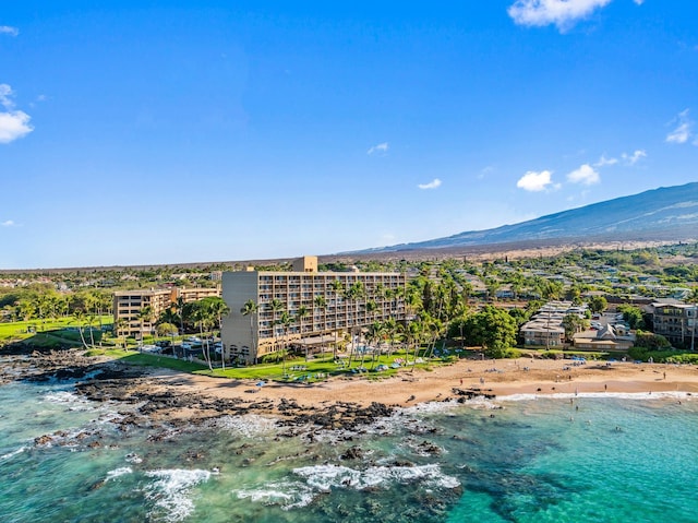 bird's eye view featuring a beach view and a water and mountain view