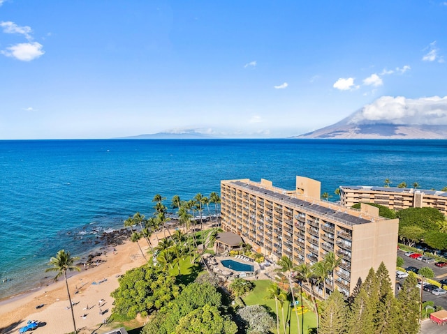 birds eye view of property featuring a water view and a view of the beach