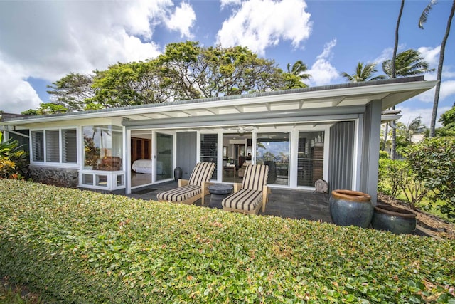 20 Hui Rd I 41, Lahaina, HI 96761 - rear view of property with a sunroom and a patio area