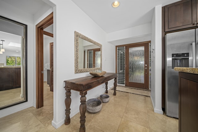 20 Hui Rd I 41, Lahaina, HI 96761 - entrance foyer featuring light tile patterned flooring, vaulted ceiling, and recessed lighting