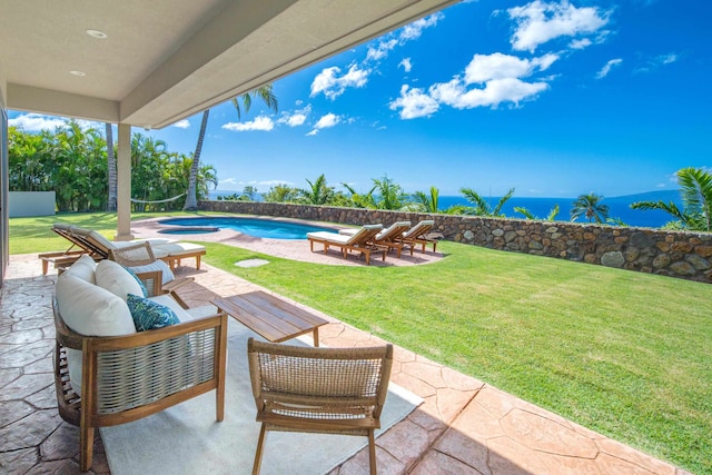 view of patio / terrace with a fenced in pool and an outdoor hangout area