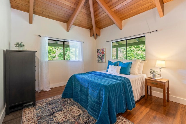 bedroom featuring wooden ceiling, wood-type flooring, and vaulted ceiling with beams