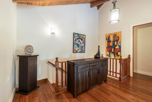 hall featuring wood ceiling, high vaulted ceiling, hardwood / wood-style flooring, and beam ceiling