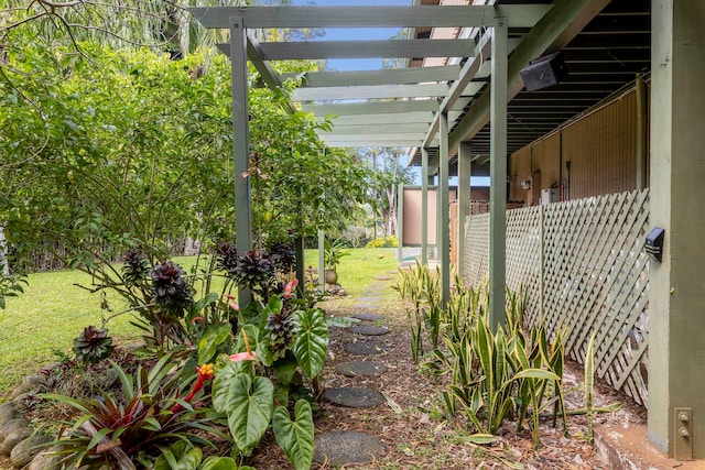 view of yard with a pergola