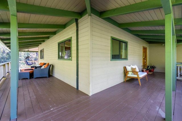 wooden deck with an outdoor hangout area