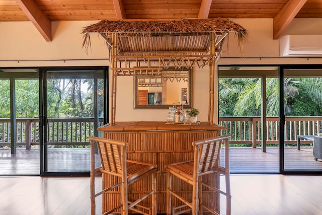 dining area featuring wood ceiling, hardwood / wood-style flooring, and beamed ceiling