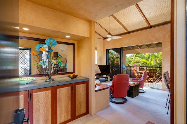 interior space featuring ceiling fan