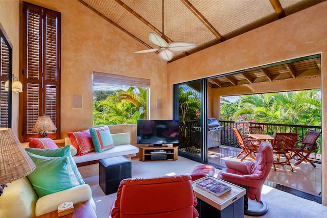 view of patio featuring ceiling fan and a grill