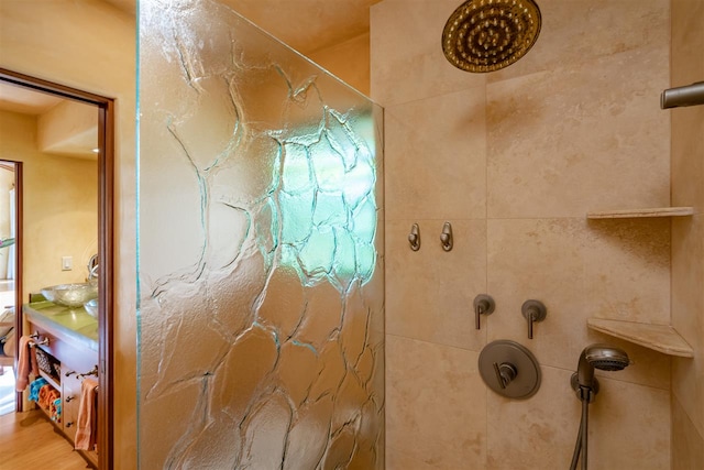 bathroom with tiled shower