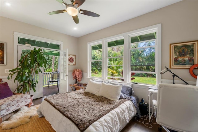 bedroom with access to outside, wood finished floors, a ceiling fan, and recessed lighting