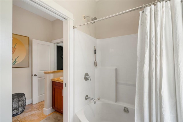 full bathroom with shower / bath combination with curtain, tile patterned flooring, and vanity